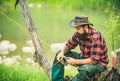 Fishing hobby and summer weekend. Bearded men fisher with fishing rod.