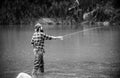 Fishing hobby and summer weekend. Bearded men fisher with fishing rod.