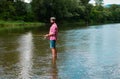 Fishing hobby and summer weekend. Bearded men fisher with fishing rod and net.