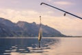 Fishing Hook and Rod In Beautiful Norwegian Landscape