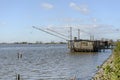 Fishing hut on the briny lagoon, Comacchio, Italy Royalty Free Stock Photo