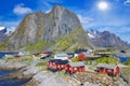 Fishing hut rorbu in the Hamnoy and Lilandstinden mountain In Background, Reine, Lofoten islands, Norway Royalty Free Stock Photo