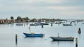 Fishing huts and boats in the Delta del Po, Italy