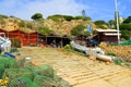 The fishing huts on Senhora Da Rocha Beach