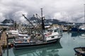 Fishing industrial trawler ships parked in marina pier in Valdez, Alaska. Royalty Free Stock Photo