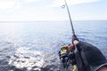 Fishing on the lake. Hands of fisherman with fishing rod. Macro shot. Fishing rod and hands of fisherman over lake water. Spinning Royalty Free Stock Photo