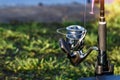 Fishing on the lake at sunset. Fisherman with rod, spinning reel on the river bank. Sunrise. Fishing for pike, perch, carp. Fog Royalty Free Stock Photo