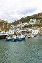 Fishing and Leisure boats moored in the historic harbour at Polperro, Cornwall Royalty Free Stock Photo