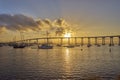 Fishing and leisure boats under a beautiful sunrise and the Coronado Bridge, San Diego California