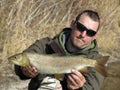 Fishing - lenok trout fishing in Mongolia Royalty Free Stock Photo