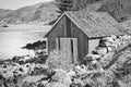 fishing lodge in norway on the fjord in black and white Royalty Free Stock Photo
