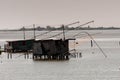 Fishing lodges and balancing nets in Comacchio, Italy.