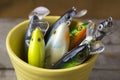 Fishing lures in a mug Royalty Free Stock Photo