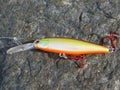 Fishing lures on rock texture Royalty Free Stock Photo