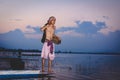 Fishing man use bamboo fish trap to catch fish in lake Royalty Free Stock Photo