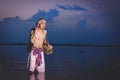 Fishing man use bamboo fish trap to catch fish Royalty Free Stock Photo