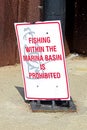 A fishing within the marina basin is prohibited sign