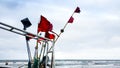 Fishing marker flags on the beach