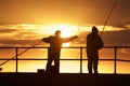 Fishing men at the beach