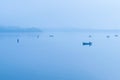 Fishing in the morning fog on the lake in Draycote waters, United Kingdom Royalty Free Stock Photo