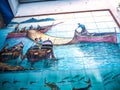 Fishing mural in the main street in the coastal city of Amalfi in Italy