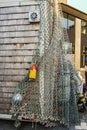 Fishing net and accessories hanging on a hut