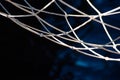 Fishing net and blue dark water surface, soft focus Royalty Free Stock Photo