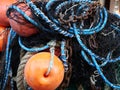 Fishing net with buoys, ropes and chains Royalty Free Stock Photo