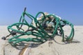 Fishing net with crab on beach Royalty Free Stock Photo