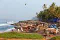 Fishing net with many fishermen on backside. Odayam beach, Varkala, India