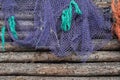 Fishing net on old wood, maritime nautical background texture