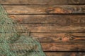 Fishing net on wooden background,