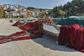 Fishing nets and Boat at the port of Limenaria, Thassos island, Greece