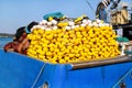 Fishing nets with floats on the pile on blue boat Royalty Free Stock Photo