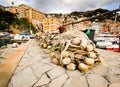 Fishing nets in front of famous town and harbor camogli in genoa italy Royalty Free Stock Photo