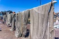 Fishing nets hanging in the sun to dry Royalty Free Stock Photo