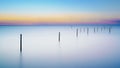 Fishing nets in lake at wonderful sunset