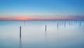 Fishing nets in lake at wonderful sunset