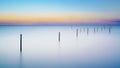 Fishing nets in lake at wonderful sunset