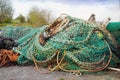 Fishing nets, ropes and rusty chains in a Castletownbere harbor Royalty Free Stock Photo