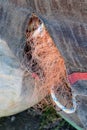 Fishing nets in a sack. A network for fishing on the fishing quay Royalty Free Stock Photo