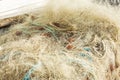Fishing nets on the shore in the marina. Close-up. Background. Space for text Royalty Free Stock Photo