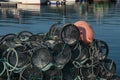 Fishing nets stacked in the harbor creel traps Royalty Free Stock Photo