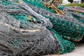Fishing Nets Tangled Together In Messy Pile In Shipyard Royalty Free Stock Photo