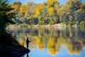 Fishing by the peaceful river Royalty Free Stock Photo