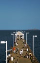 Fishing Pier And Battle Ship Royalty Free Stock Photo