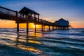 Fishing pier in the Gulf of Mexico at sunset, Clearwater Beach, Royalty Free Stock Photo