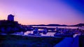 Fishing pier with ships in evening Royalty Free Stock Photo