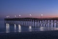 Fishing pier silhouette sunset blue hour Royalty Free Stock Photo