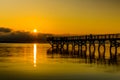 Fishing from the Pier at Sunrise on the York River in Yorktown, Virginia Royalty Free Stock Photo